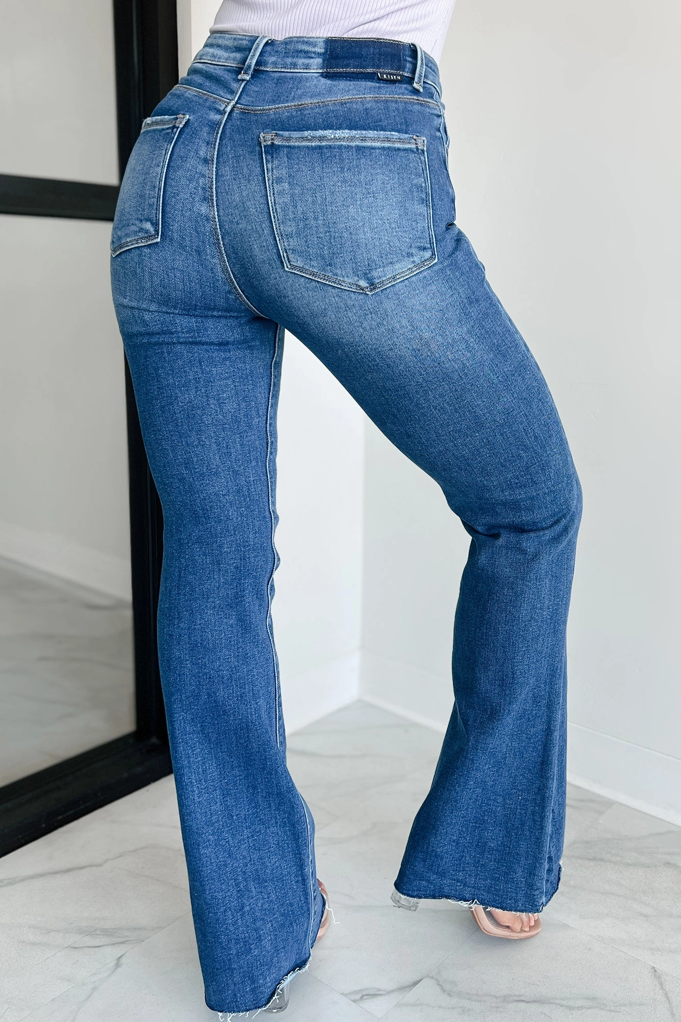 Brynn High Rise Raw Cut Risen Non Distressed Jeans (Dark) Smart Comfort Carbon Infused Fabric