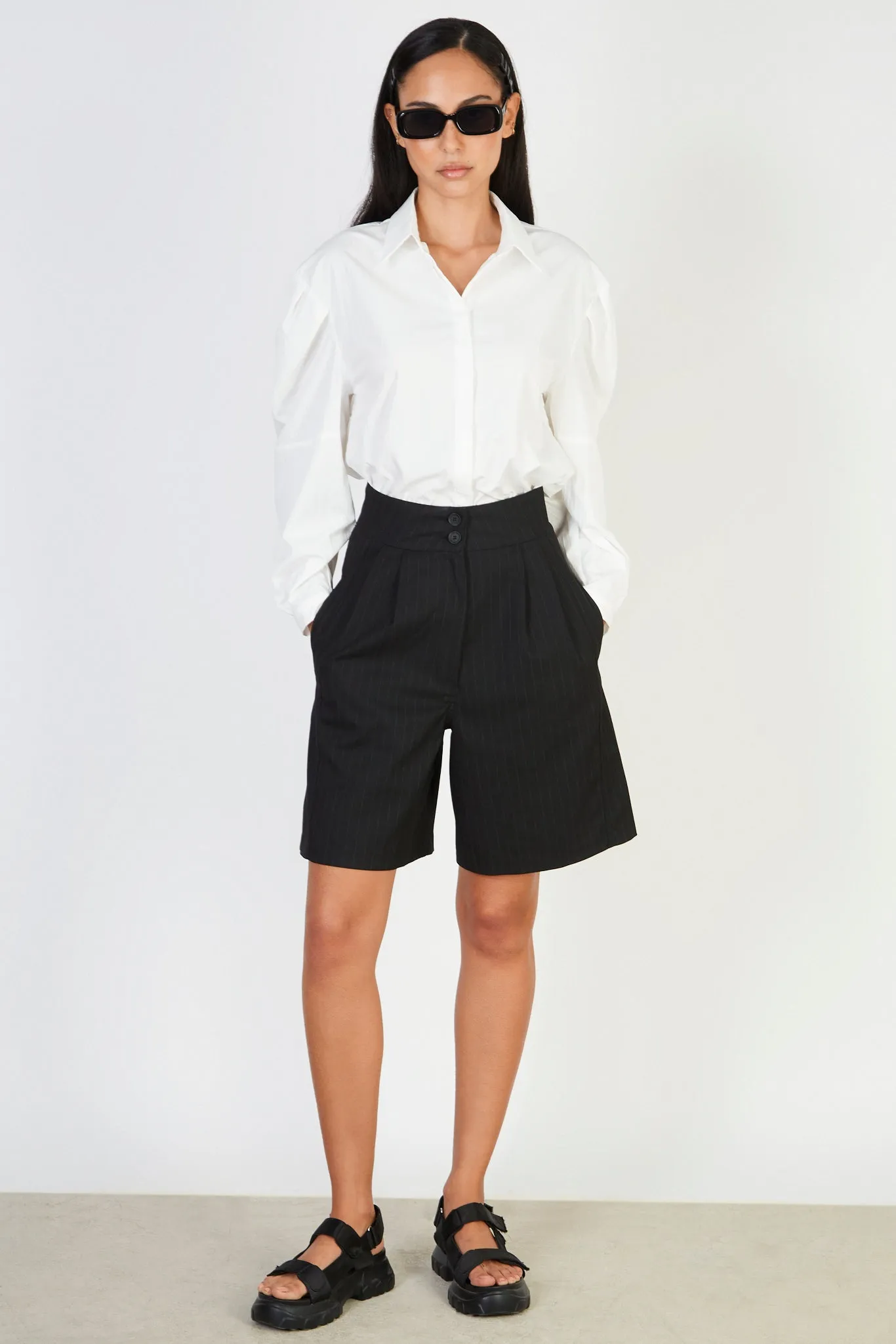 Black pinstriped tailored shorts