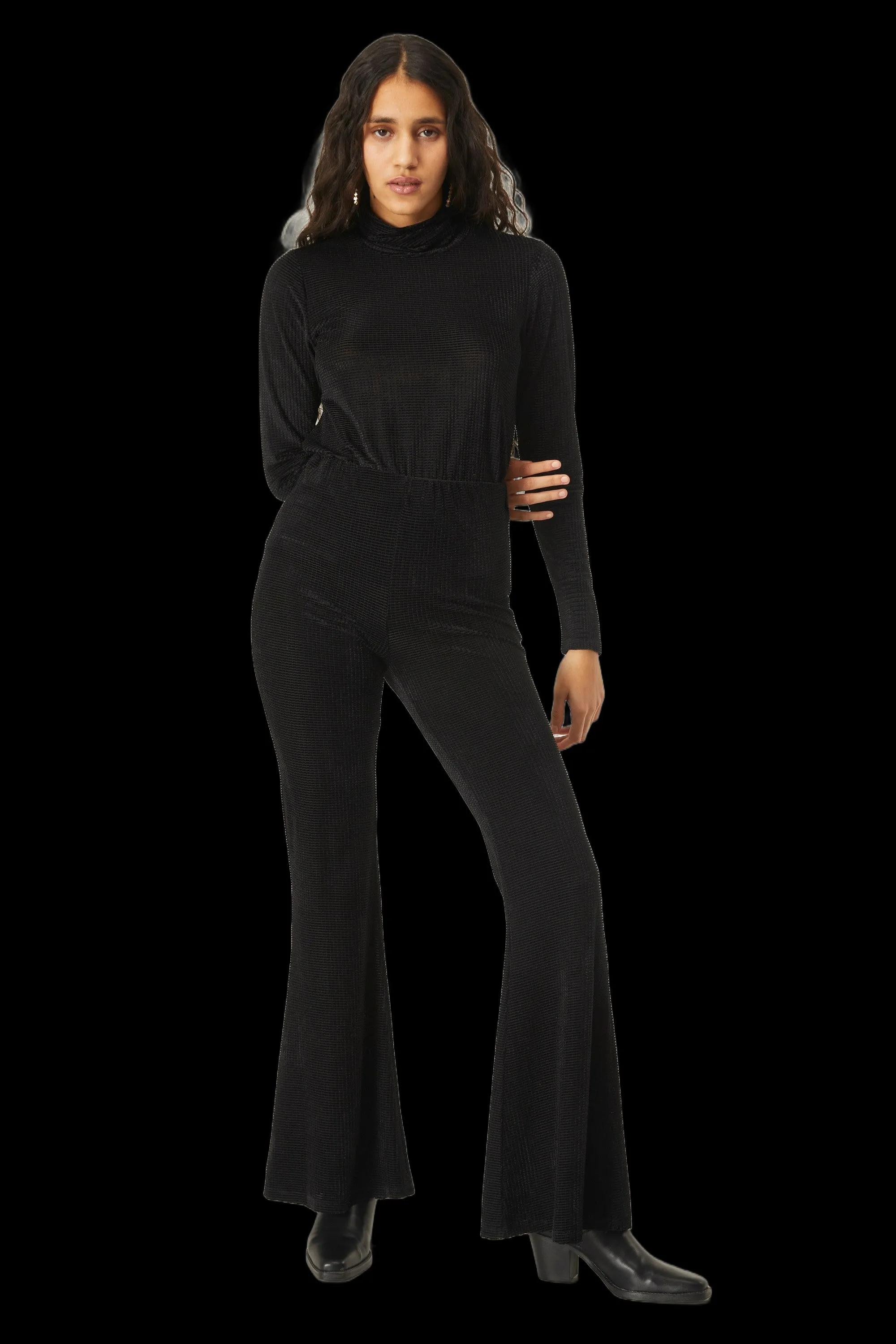 Black velvet flared trousers by Compania Fantastica