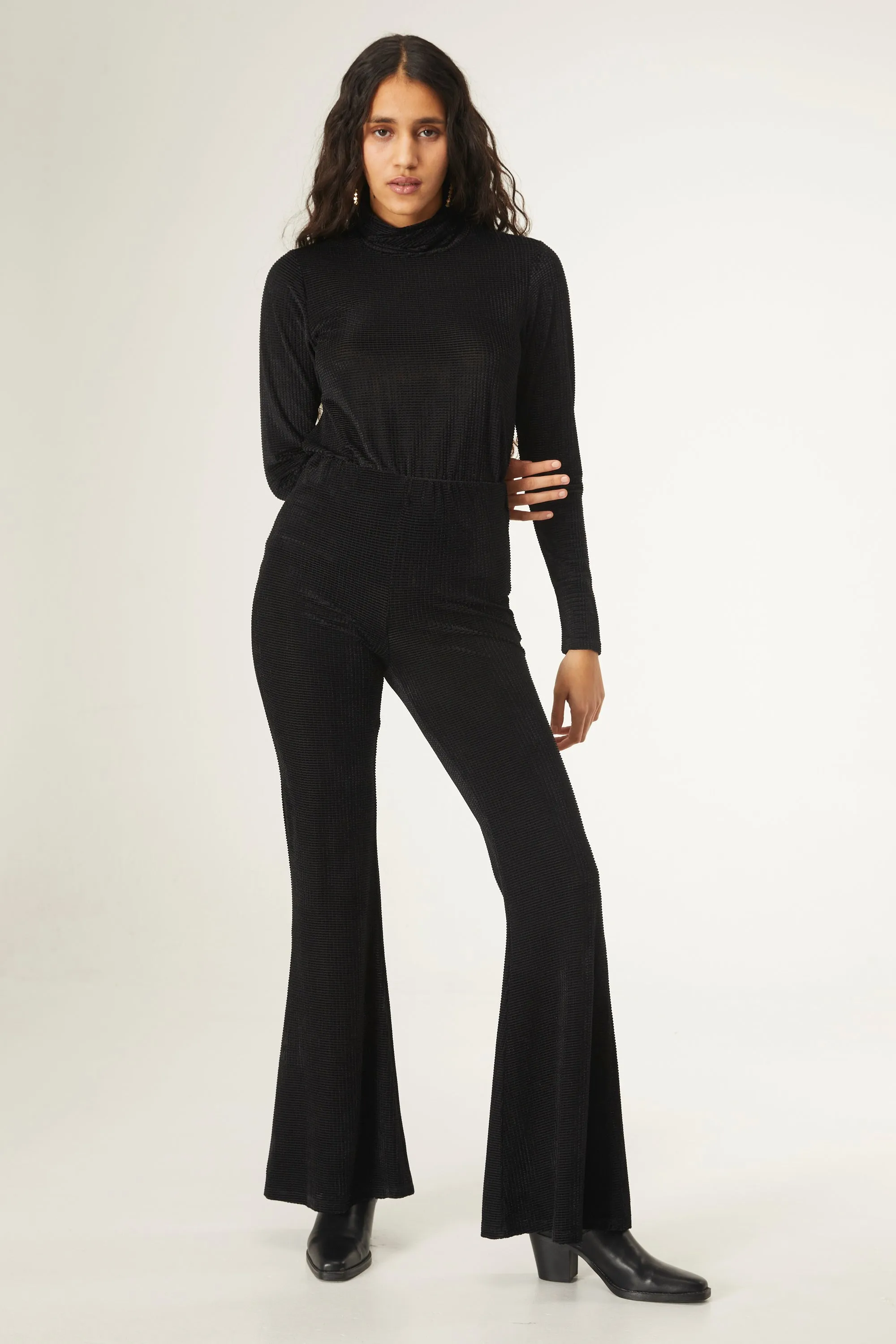 Black velvet flared trousers by Compania Fantastica