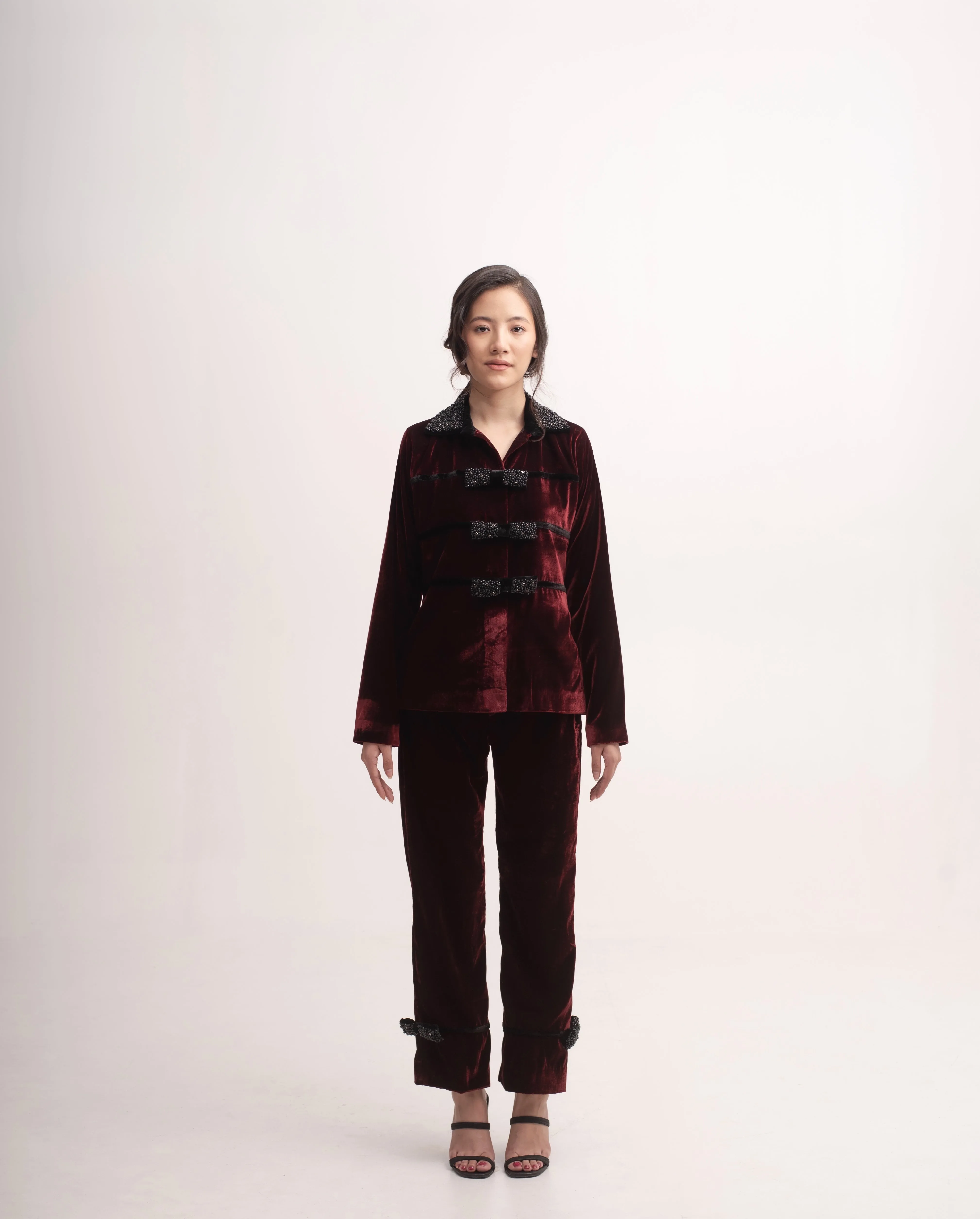 Silk-velvet high-waisted trousers with embellished bows