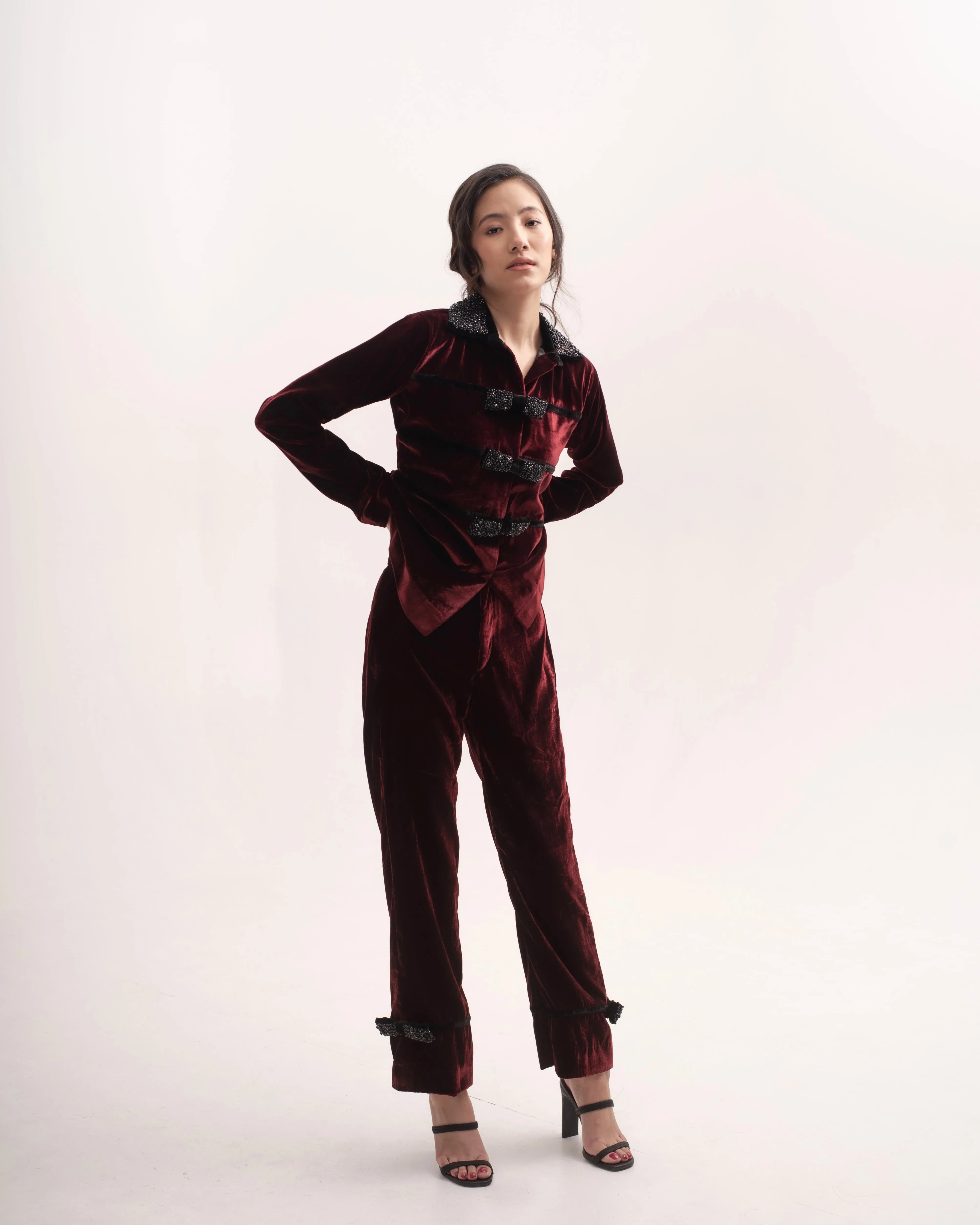 Silk-velvet high-waisted trousers with embellished bows