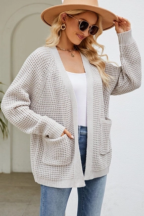 WOMEN RIBBED KNIT CARDIGAN WITH POCKETS Bold Design Placket Detailing